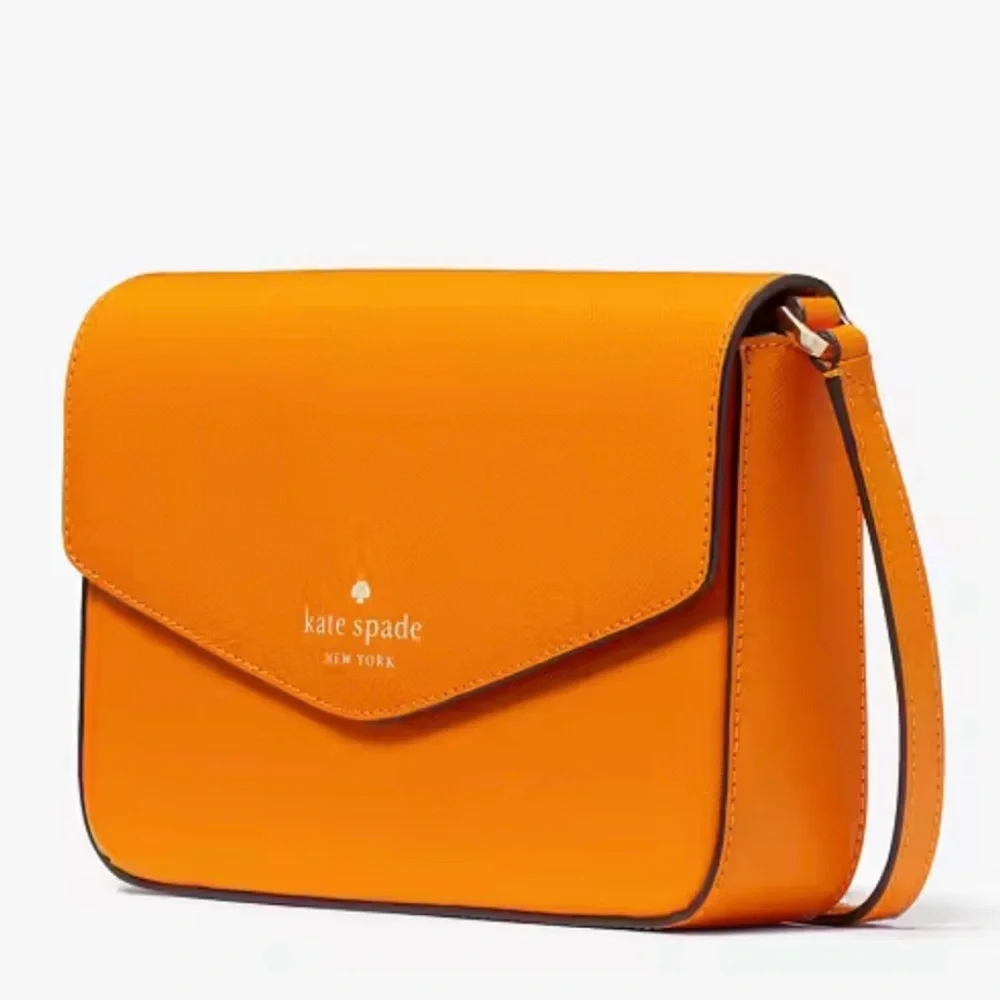 Kate Spade NY Sadie Envelope Crossbody in Turmeric Root Bright Orange K7338